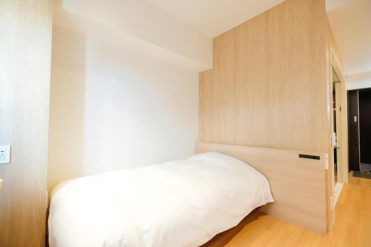 Ele Hotel Kuzuha Hirakata Bagian luar foto