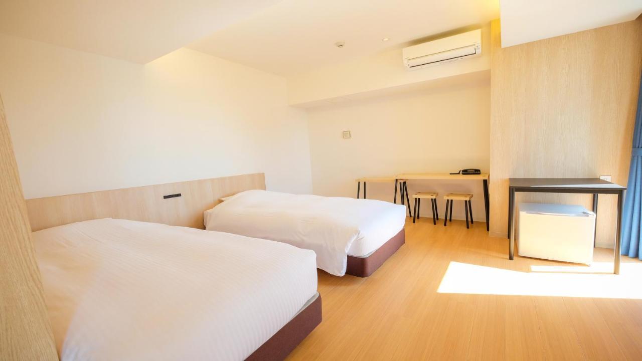 Ele Hotel Kuzuha Hirakata Bagian luar foto